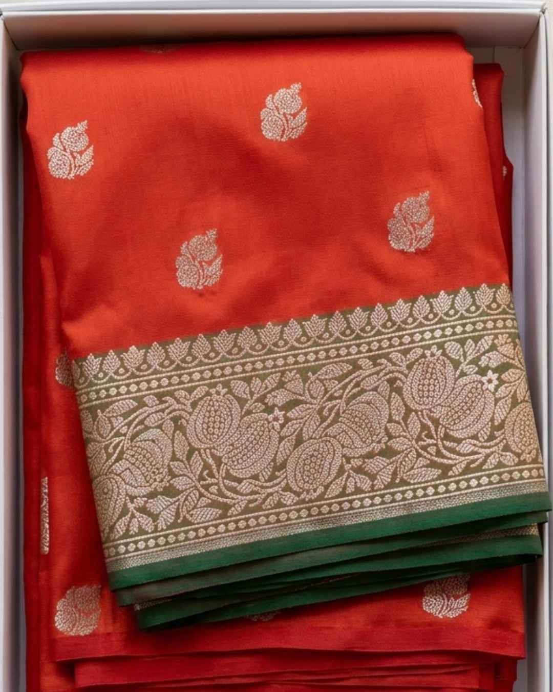 Vasudha - Red Silver Zari Floral Green Border Saree