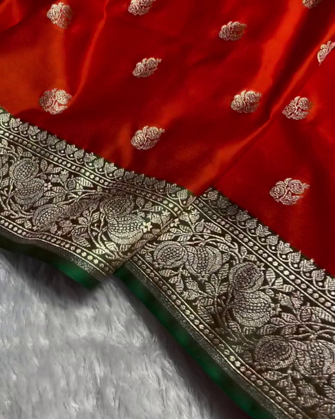 Vasudha - Red Silver Zari Floral Green Border Saree