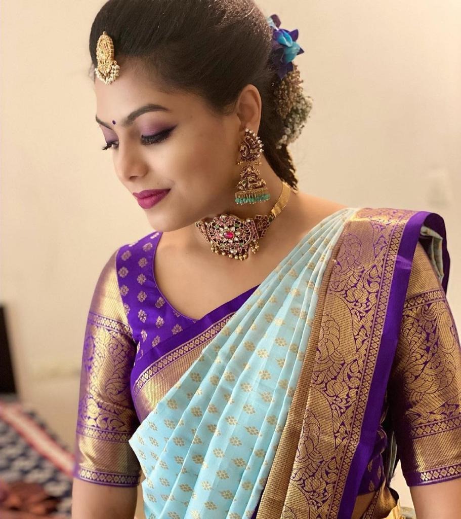 Nirmala - Firozi Soft Banarasi Silk Saree with Purple Jacquard Blouse