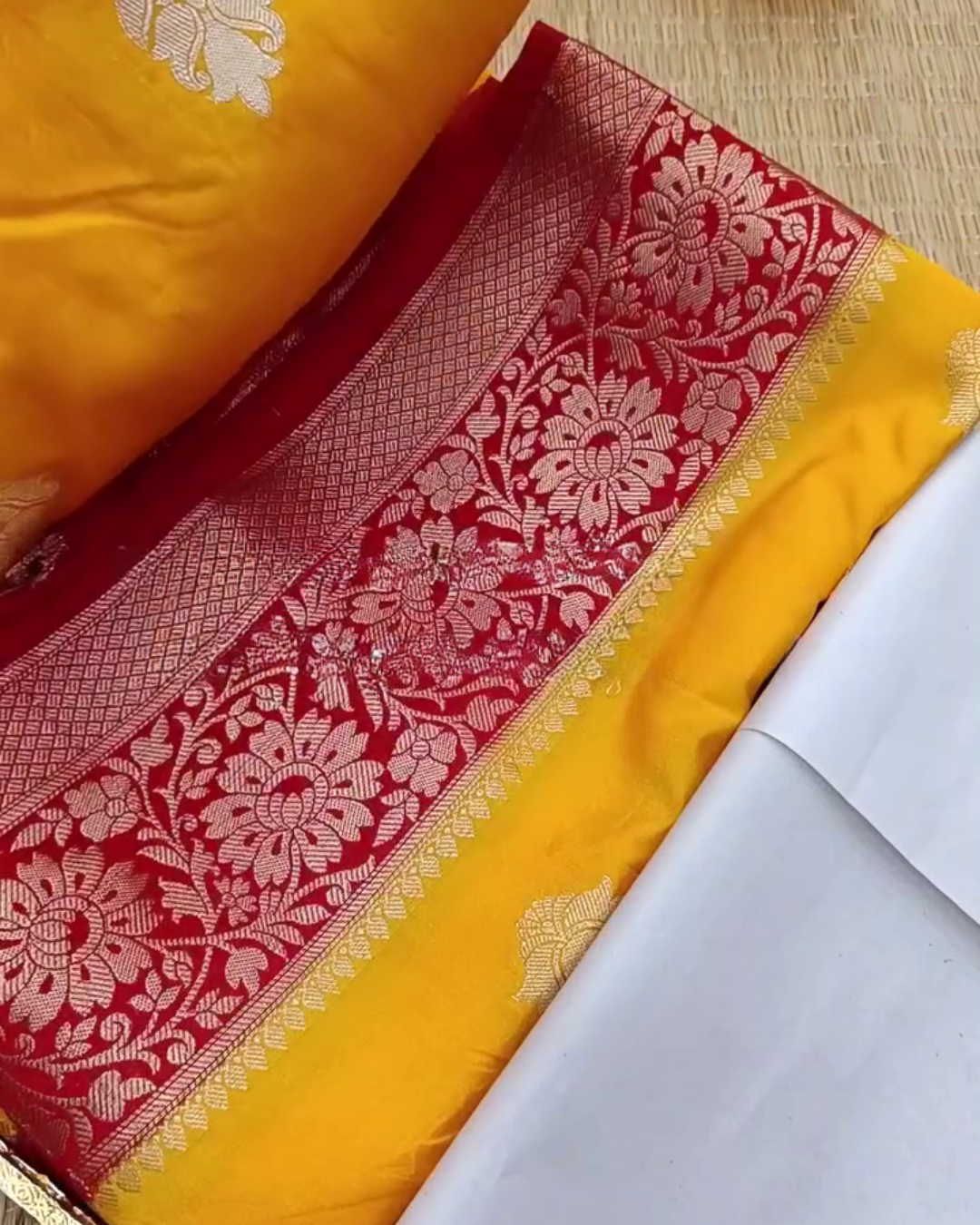 Vasundhara – Yellow Banarasi Silk Saree with Red Floral Zari Border and Butta