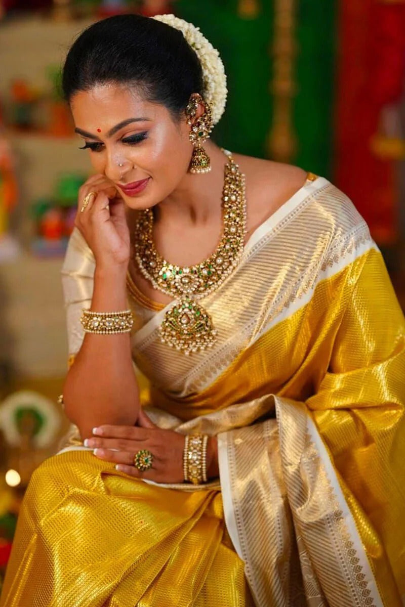 Sumitra - Yellow Kanjivaram Silk Saree with Rich Zari Weaving Border