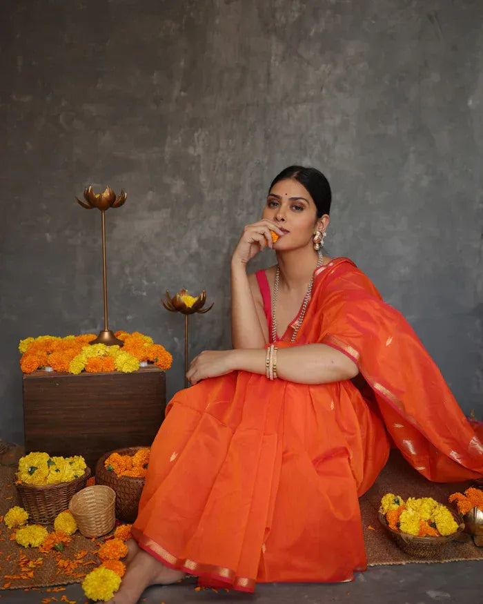 Mithali – Orange Pure Linen Silk Saree with jacquard weaving work