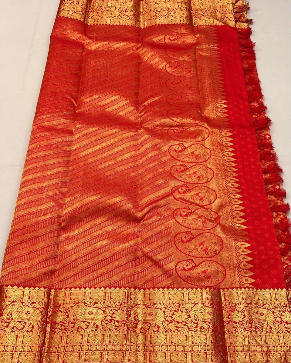 Bhairavi – Temple Red Banarasi Soft Silk Saree with Elephant Zari Border & Paisley Pallu