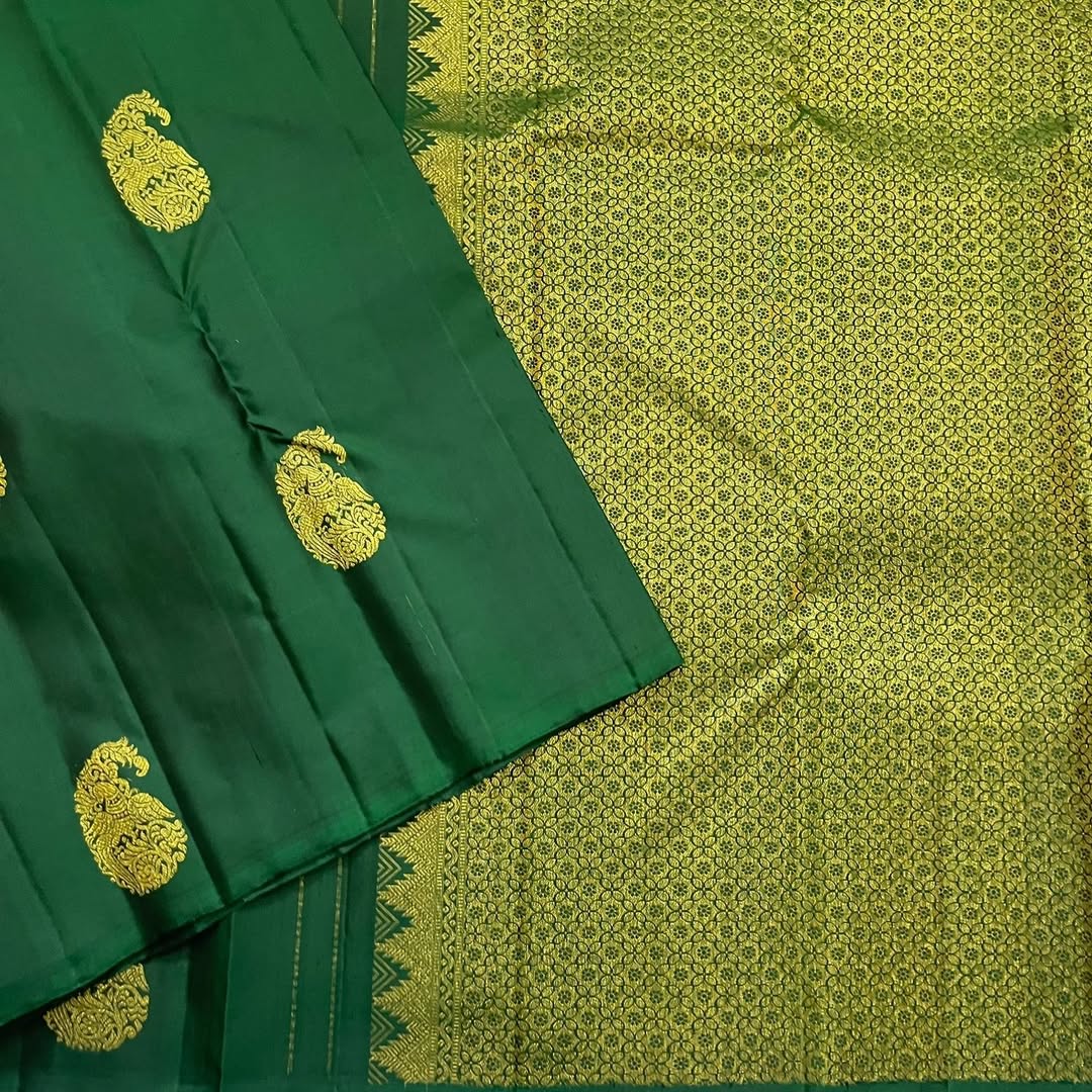 Renuka – Emerald Green Banarasi Soft Silk Saree with Royal Paisley Zari & Grand Pallu
