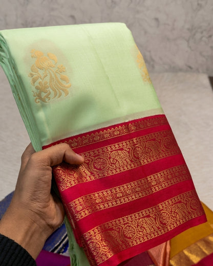 Dixa - Mint Green Magenta Floral Zari Woven Saree