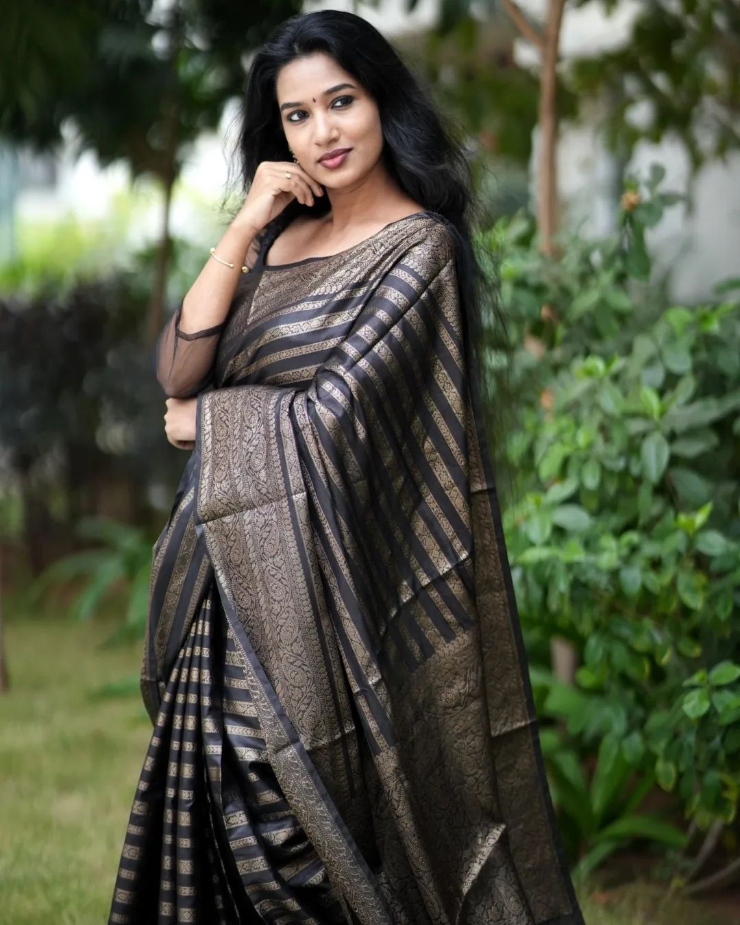 Delectable Ebony Soft Silk Saree