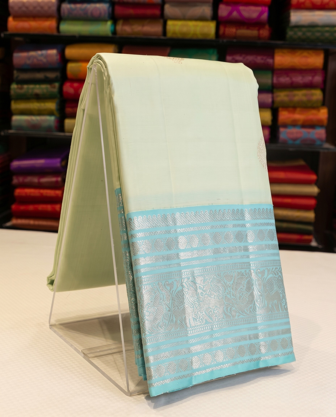 Menka - Pastel Kanjivaram Silk Saree with Zari Border
