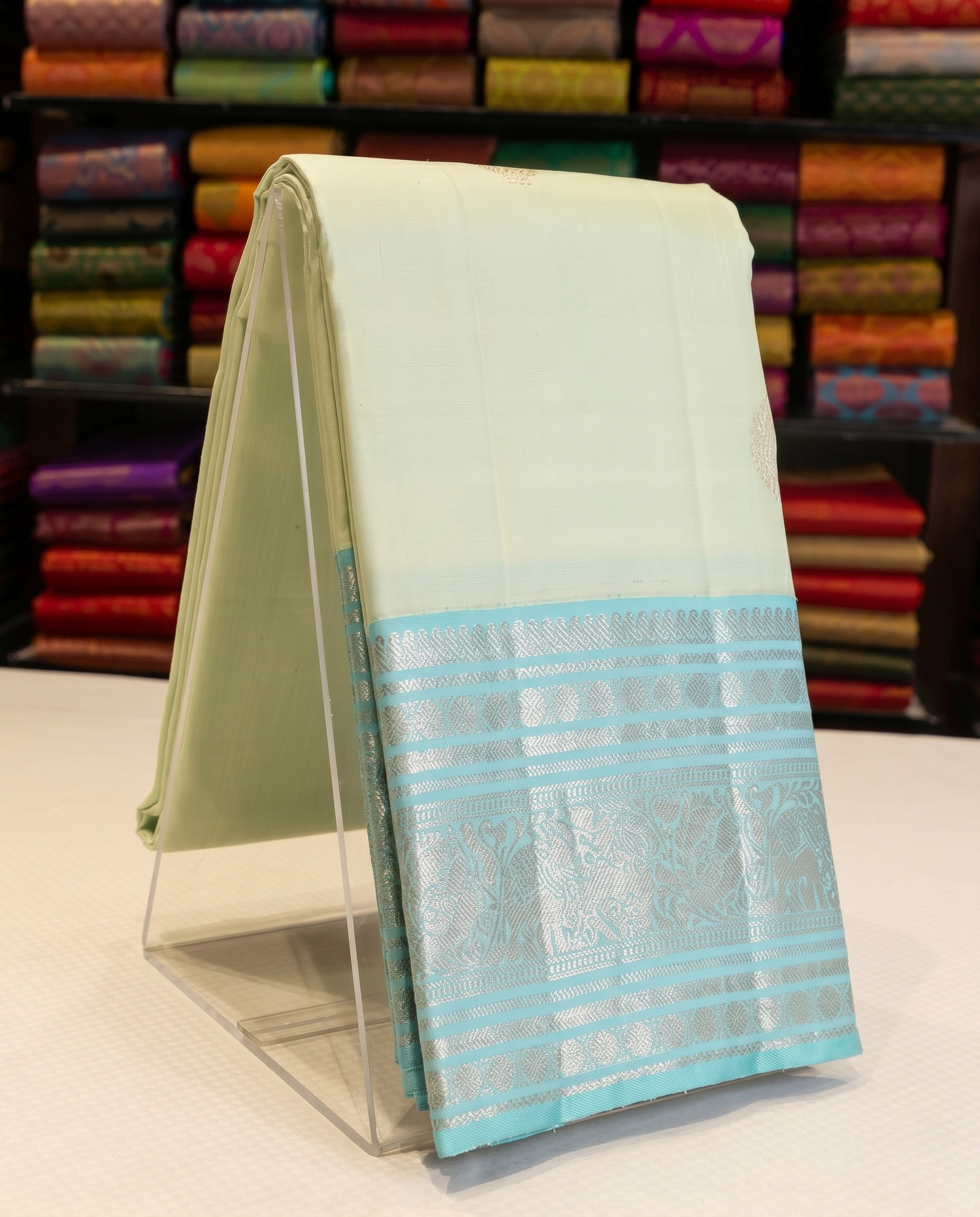 Menka - Pastel Kanjivaram Silk Saree with Zari Border