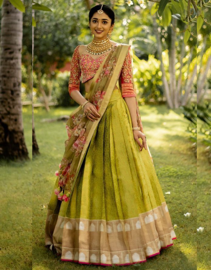 Seema Peach-Musted Yellow Kanchipuram Lehenga Choli