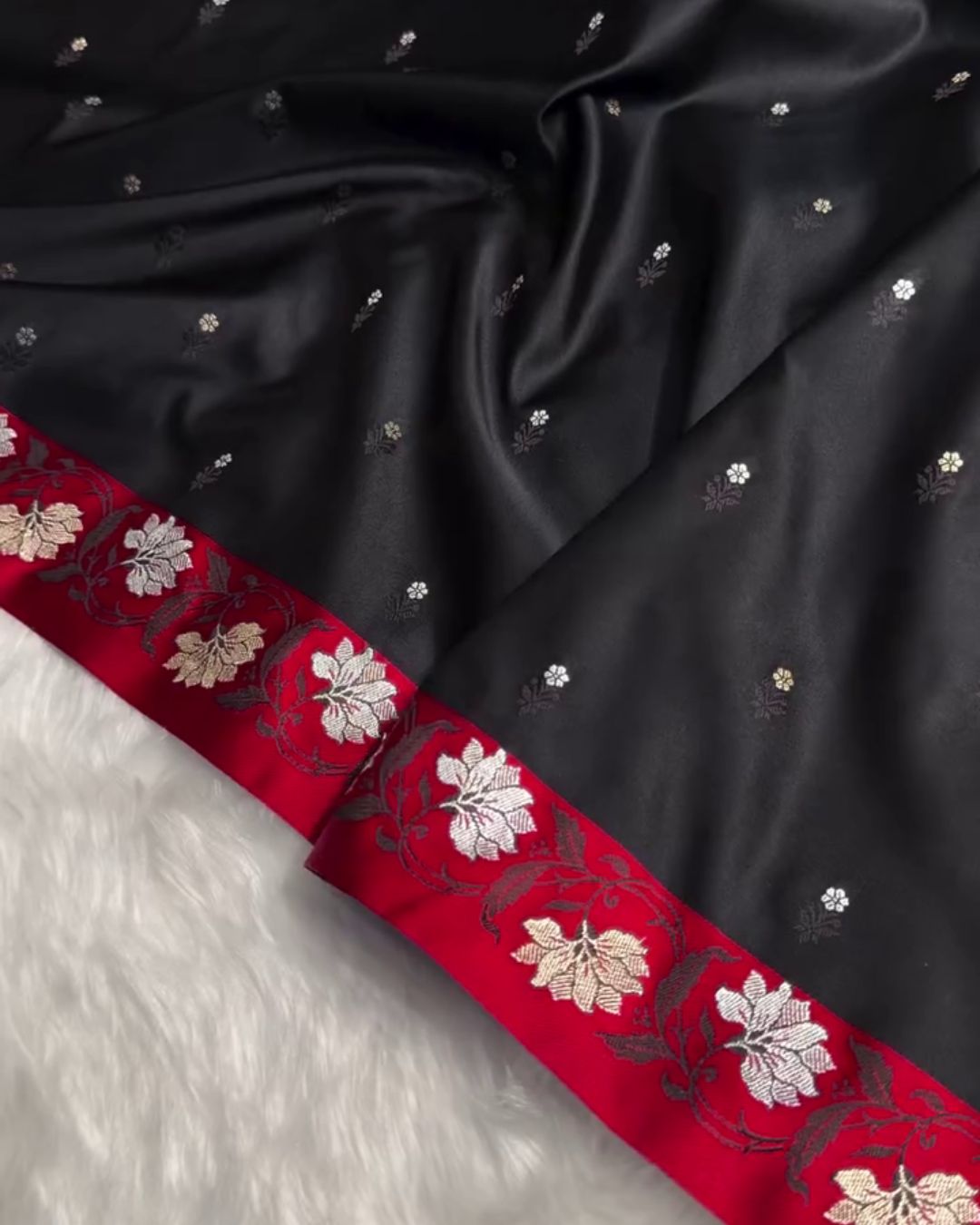 Indrani - Black Banarasi Satin Saree with Zari Floral Red Border