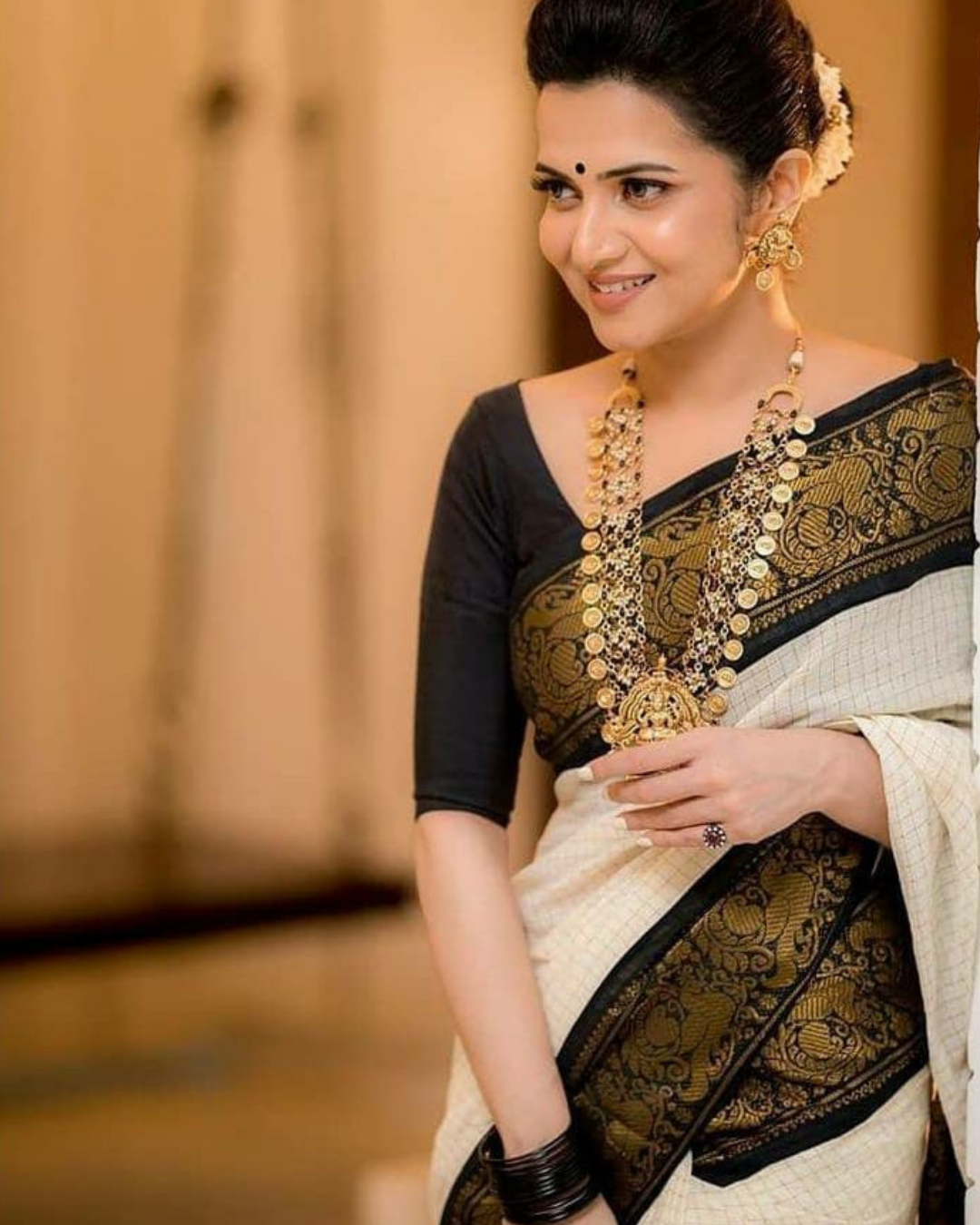 Richa Off-White Coloured Kanchipuram Silk Saree