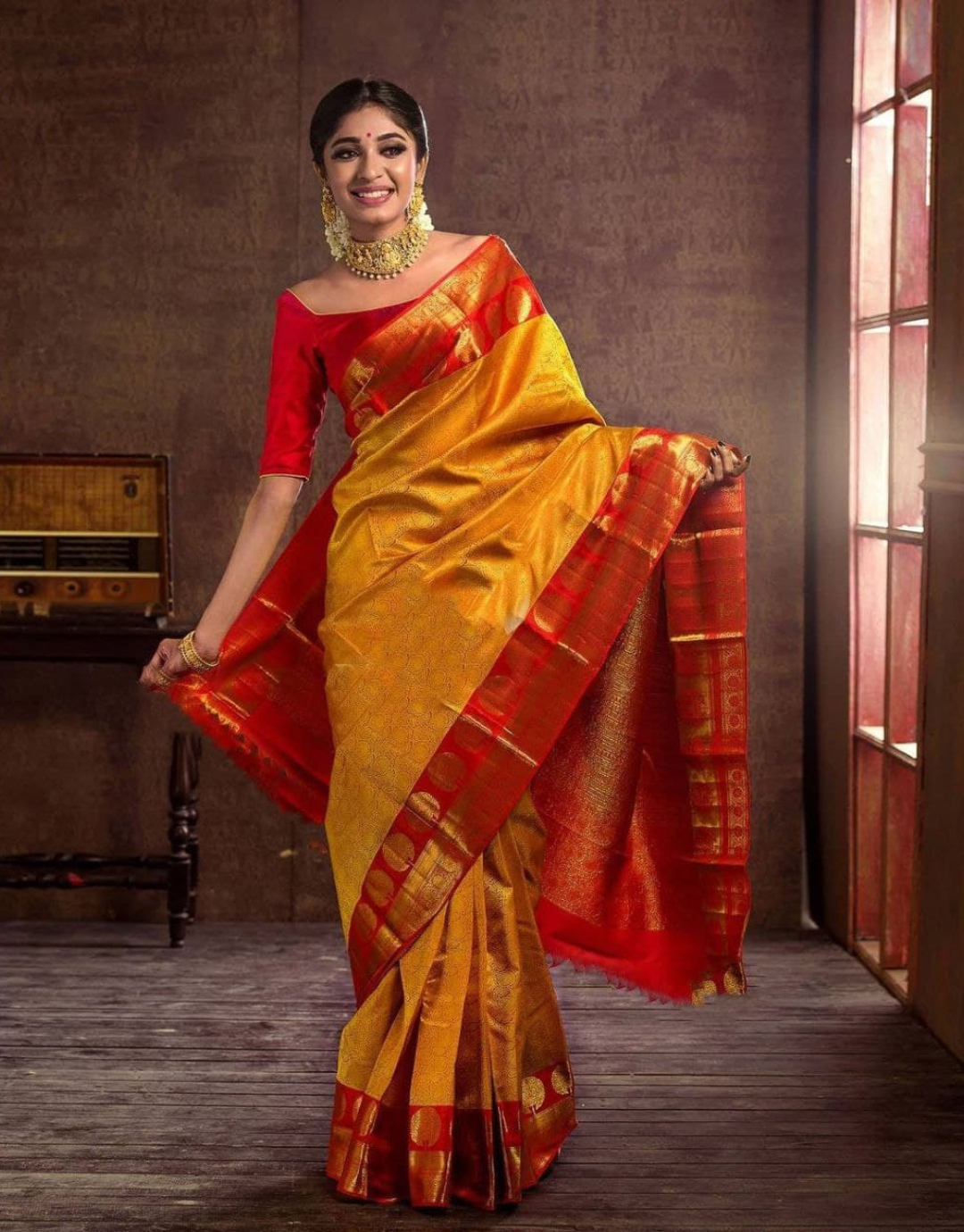 Urvi Yellow Kanchipuram Silk Saree With Attractive Blouse