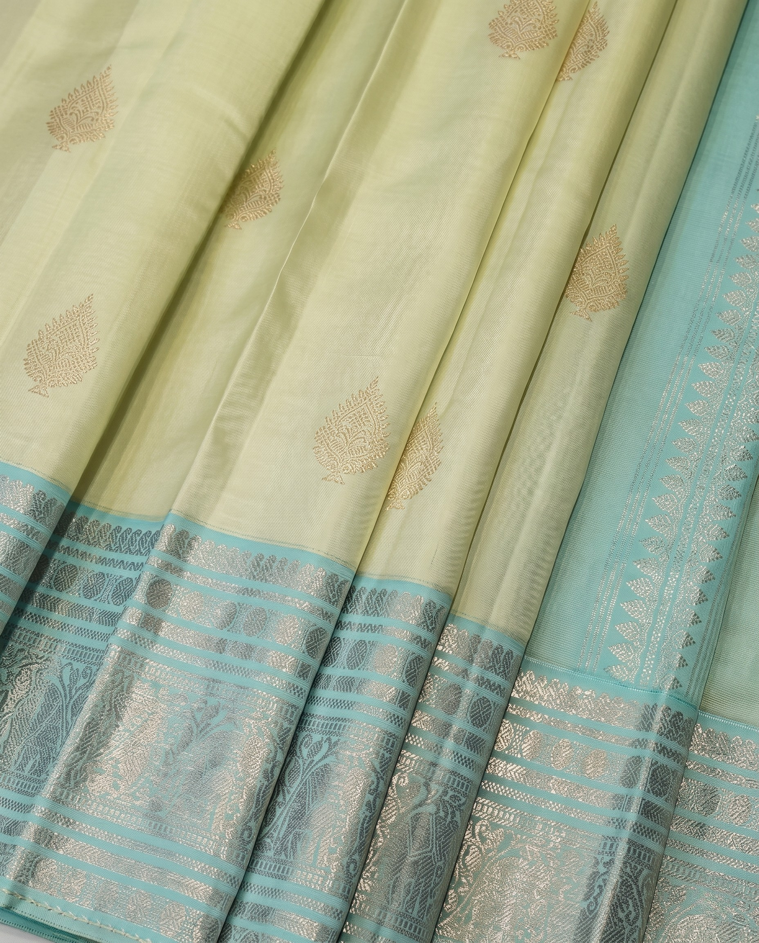 Menka - Pastel Kanjivaram Silk Saree with Zari Border