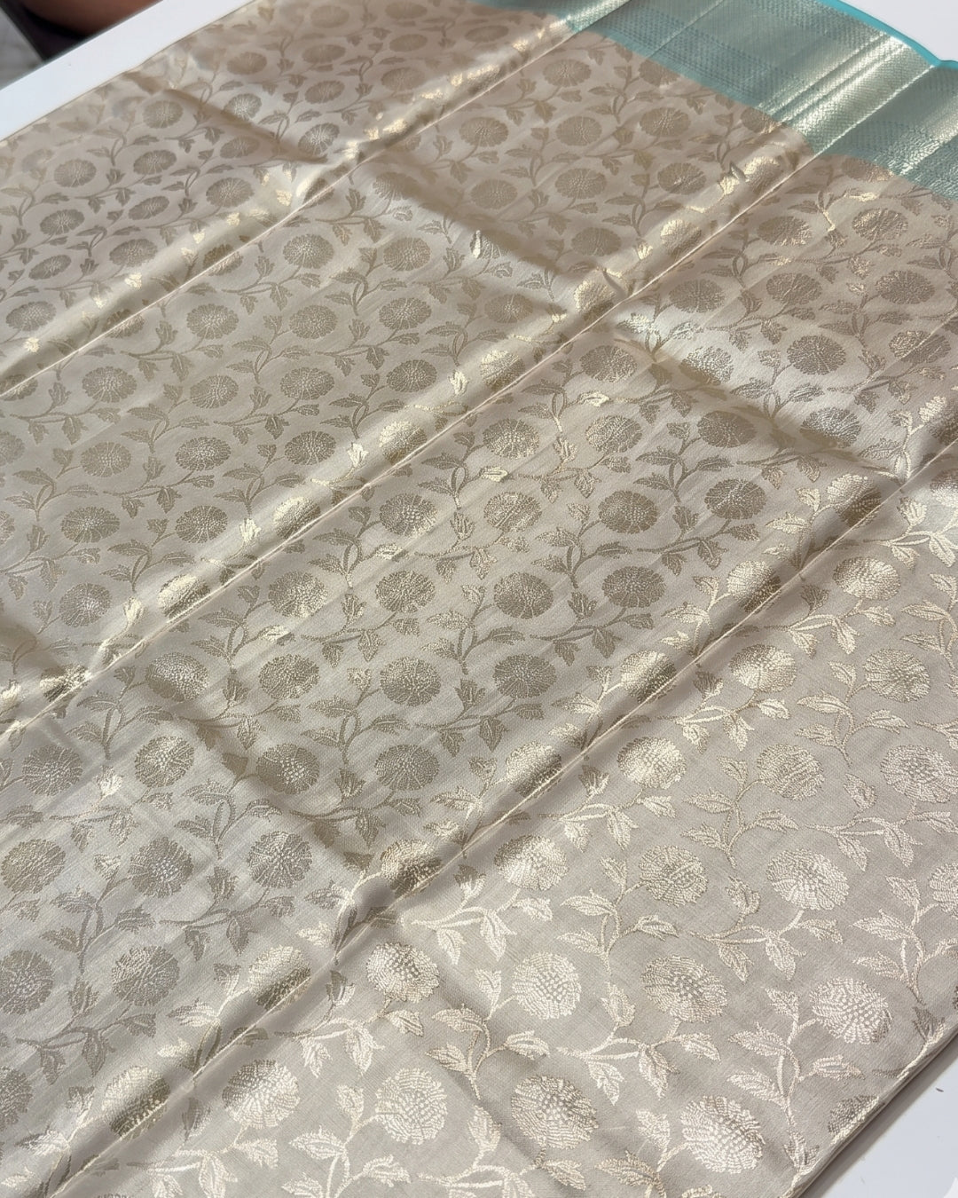 Maithili - Ivory Aqua Floral Weave Saree