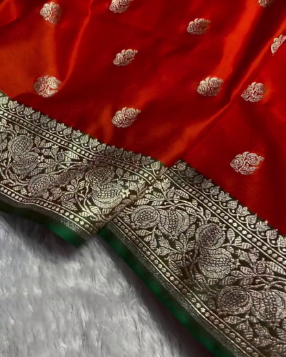 Vasudha - Red Silver Zari Floral Green Border Saree
