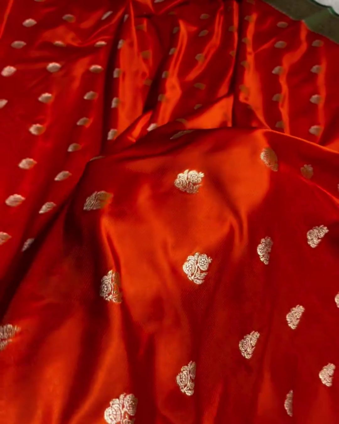 Vasudha - Red Silver Zari Floral Green Border Saree