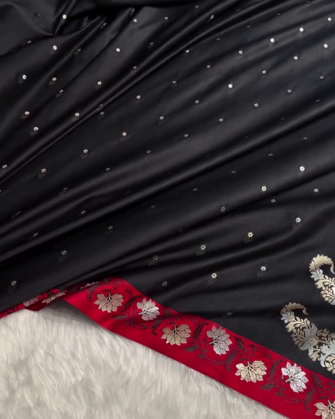 Indrani - Black Banarasi Satin Saree with Zari Floral Red Border