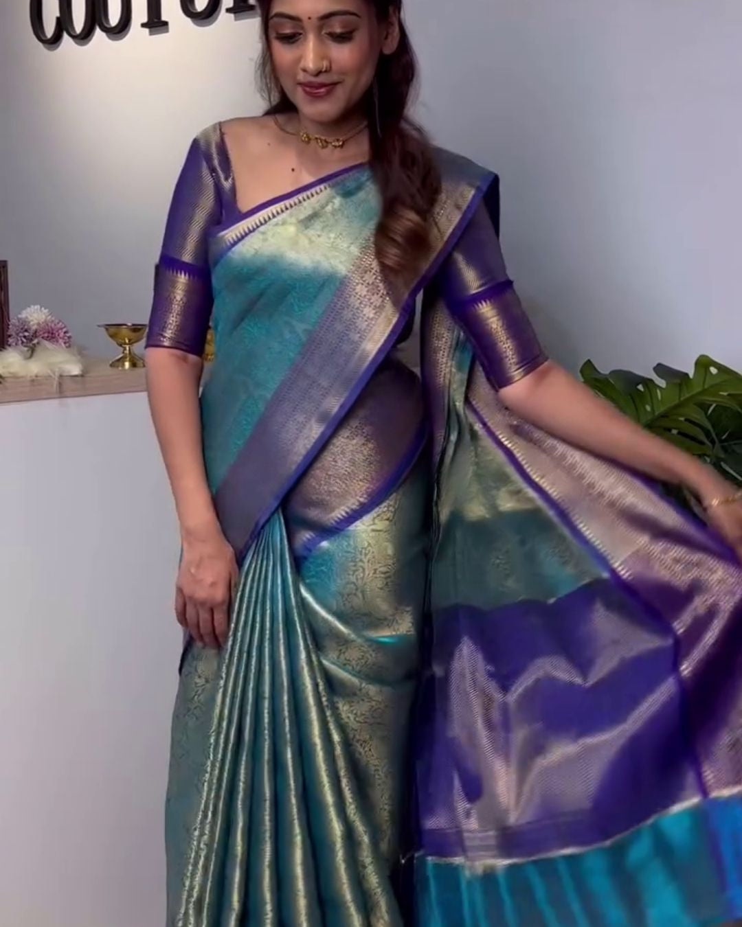 Dhriti - Teal Blue Banarasi Silk Saree with Zari Floral Border