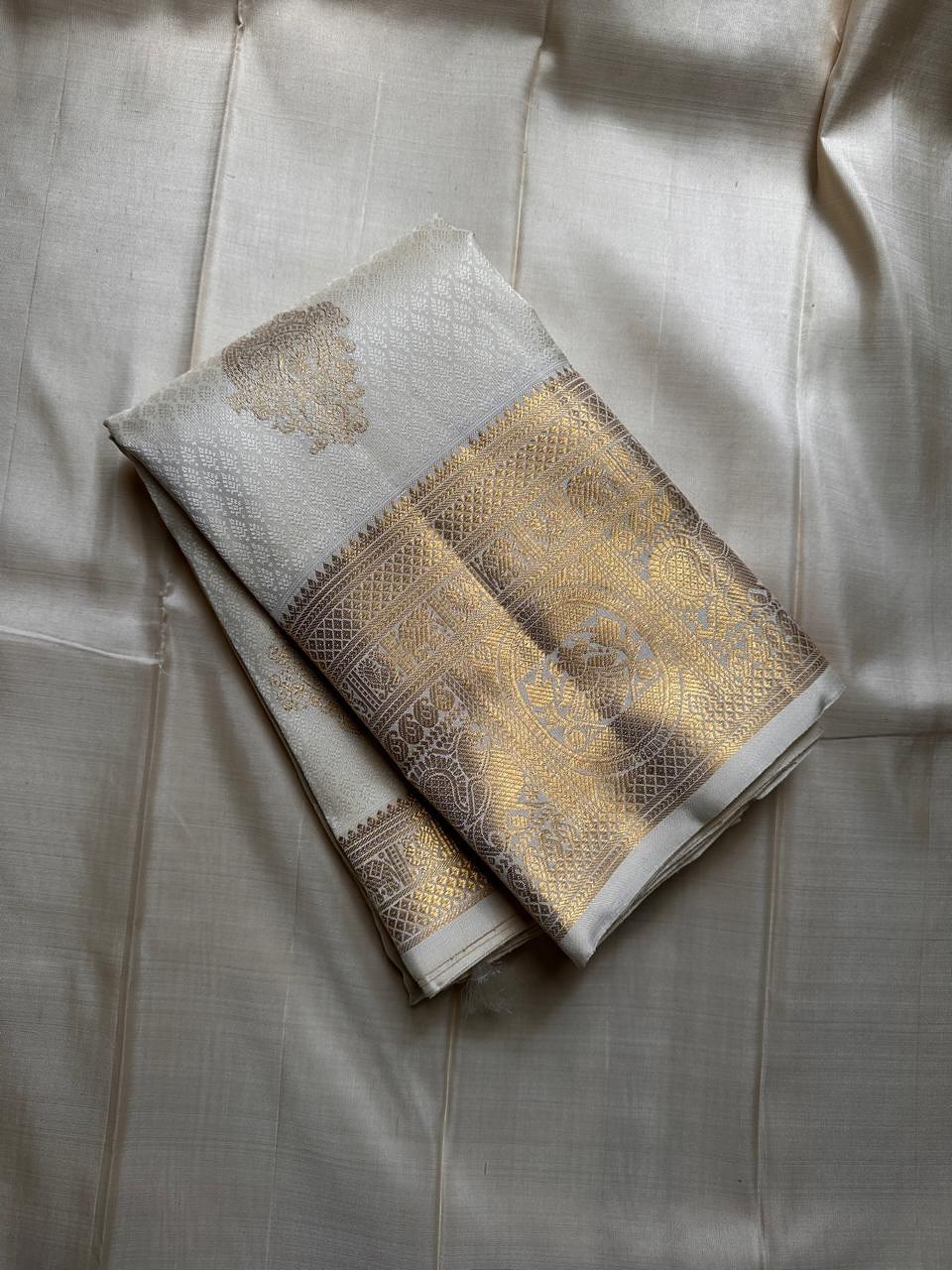 Dakshayani – Off White Banarasi Soft Silk Saree with Gold Zari Butti &amp; Grand Border