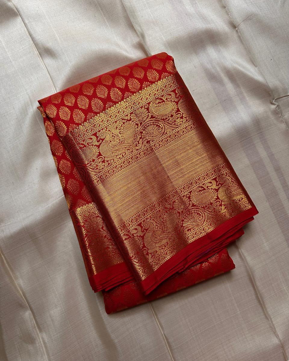 Shruti – Vermilion Red Banarasi Soft Silk Saree with Gold Butti &amp; Regal Peacock Border