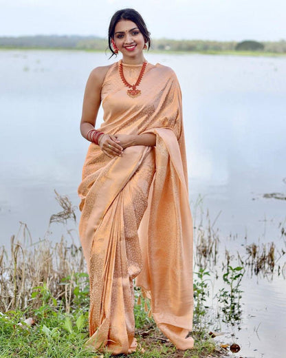 Jenisha Light Peach Banarasi Silk Saree With Fabulous Blouse Piece