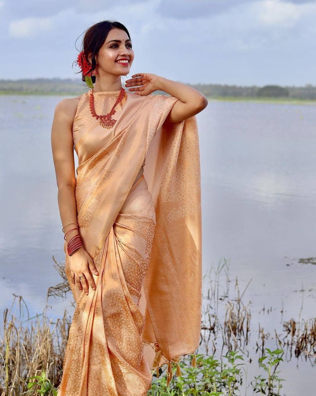 Jenisha Light Peach Banarasi Silk Saree With Fabulous Blouse Piece