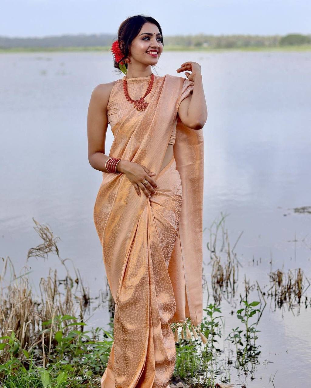 Jenisha Light Peach Banarasi Silk Saree With Fabulous Blouse Piece