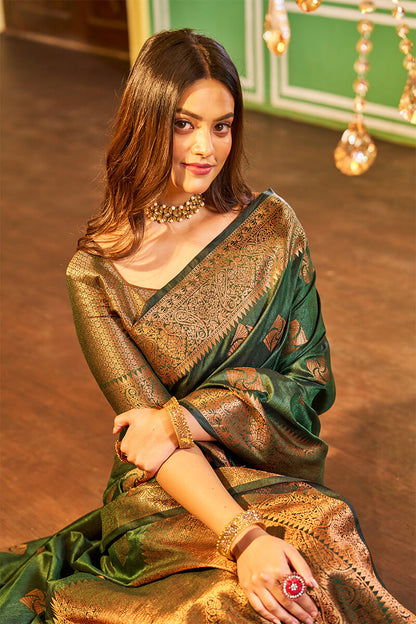 Rani Dark Green Soft Banarasi Silk Saree With Gratifying Blouse Piece