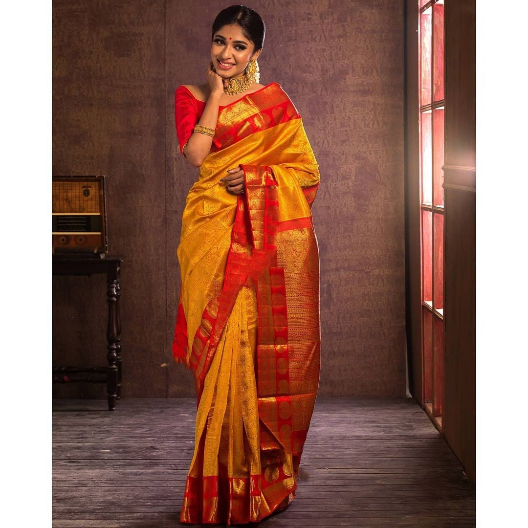 Aaradhya Yellow Soft Banarasi Silk Saree With Attached Blouse