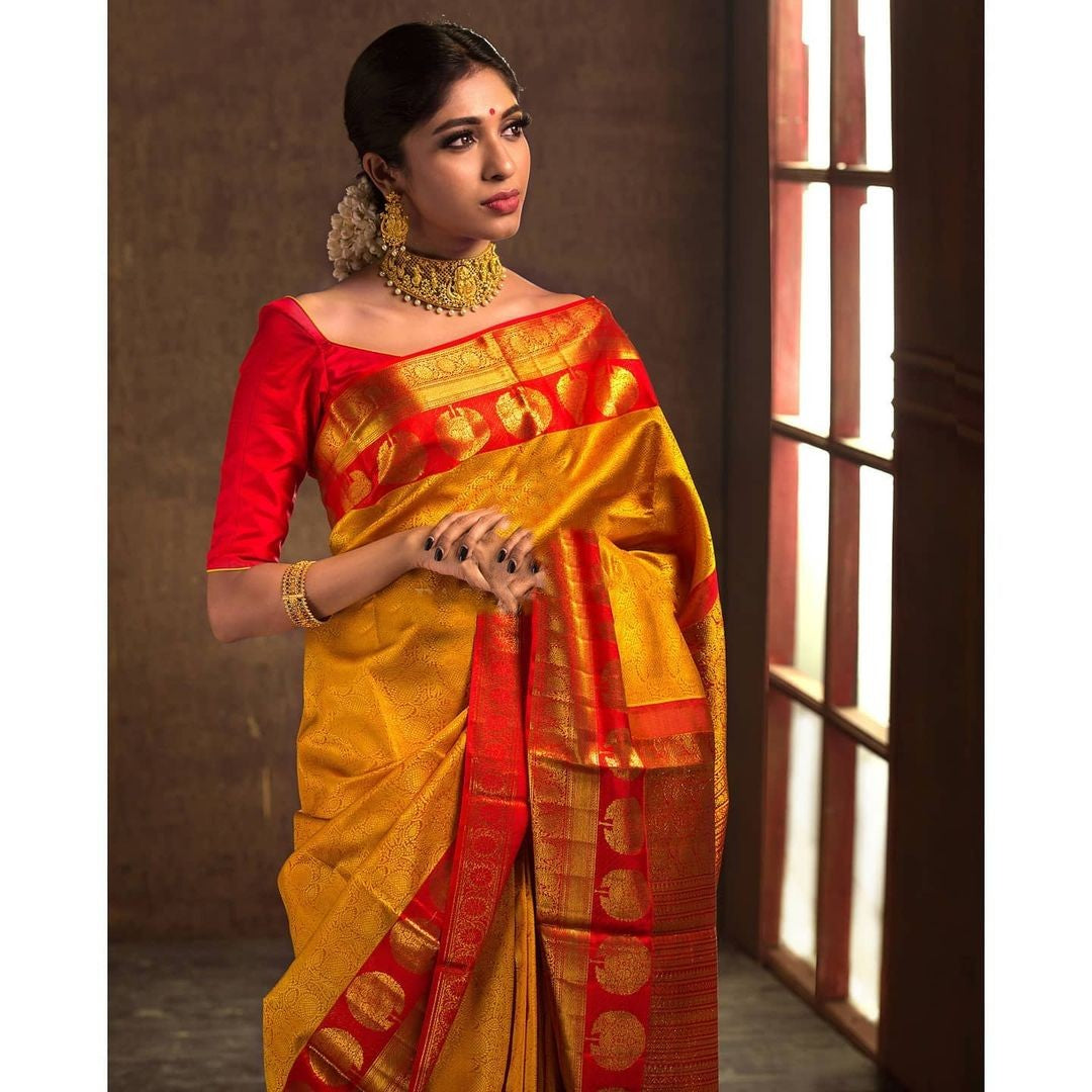 Aaradhya Yellow Soft Banarasi Silk Saree With Attached Blouse